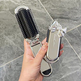 Складаний гребінець для волосся з дзеркалом